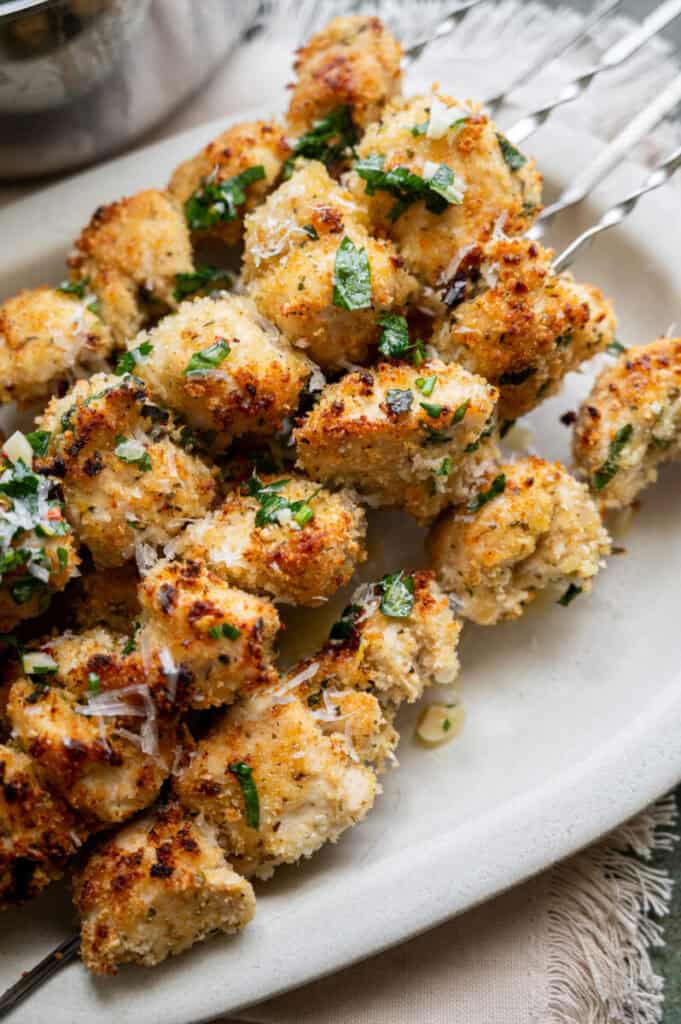 chicken speeding on metal skewers.