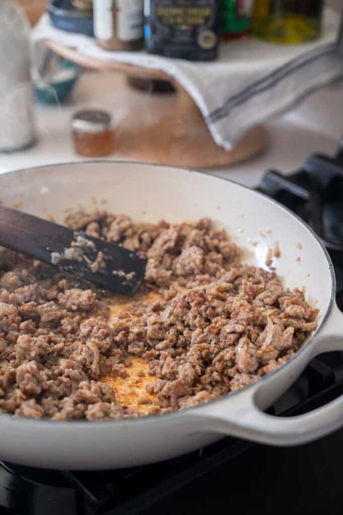 italian sausage in a skillet.