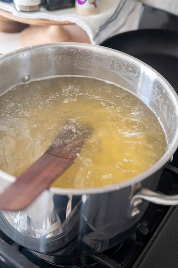 ziti cooking in a pot.